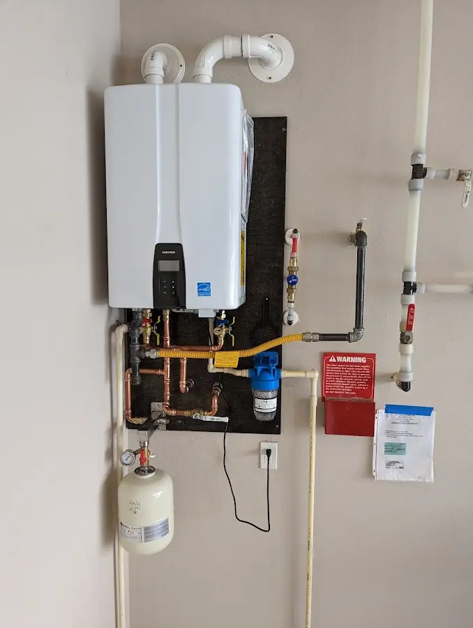 Professional plumber installing copper piping in a Levelland home